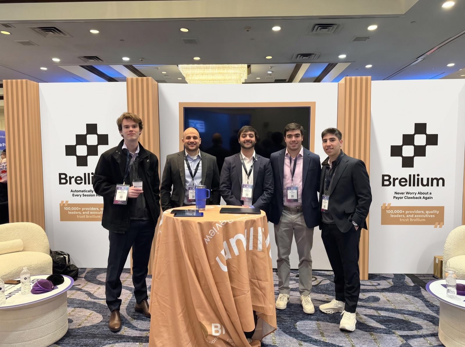 Brellium team at booth